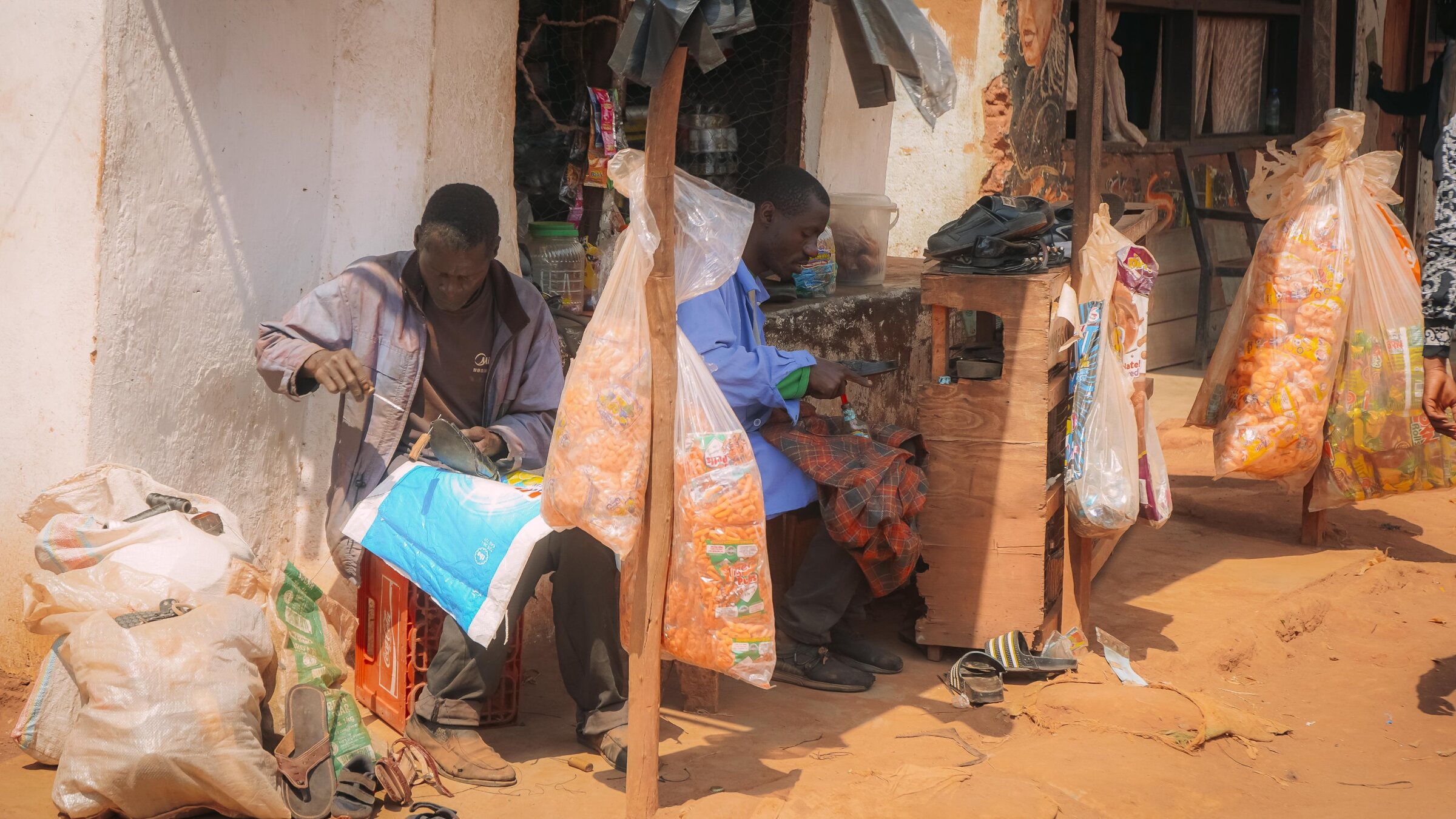 Dzaleka community members working together at a local marketplace